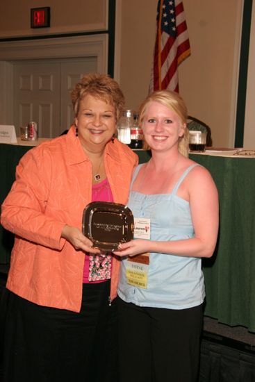 Kathy Williams and Lauren Davis With Award at Friday Convention Session Photograph 1, July 14, 2006 (image)