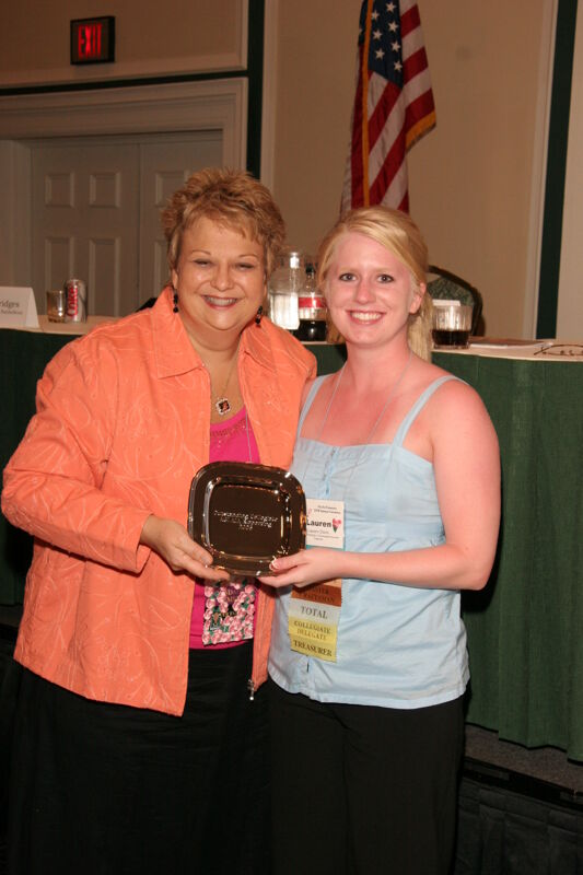 July 14 Kathy Williams and Lauren Davis With Award at Friday Convention Session Photograph 1 Image
