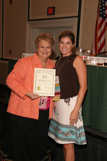 Kathy Williams and Alpha Zeta Chapter Member With Certificate at Friday Convention Session Photograph, July 14, 2006 (image)