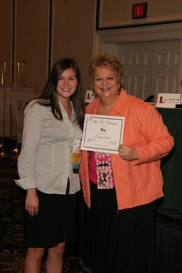 Kathy Williams and Nu Chapter Member With Legacy Award at Friday Convention Session Photograph, July 14, 2006 (image)