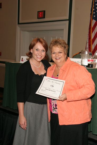 Kathy Williams and Chi Chapter Member With Certificate at Friday Convention Session Photograph, July 14, 2006 (image)