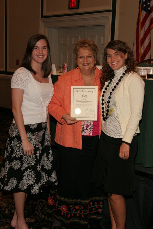 July 14 Kathy Williams and Alpha Rho Chapter Members With Certificate at Friday Convention Session Photograph Image