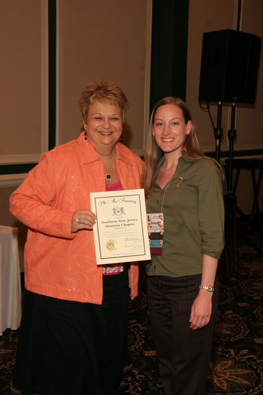 July 14 Kathy Williams and Southern New Jersey Alumnae Chapter Member With Certificate at Friday Convention Session Photograph Image