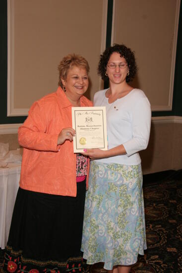 Kathy Williams and Boston Alumnae Chapter Member With Certificate at Friday Convention Session Photograph 1, July 14, 2006 (image)