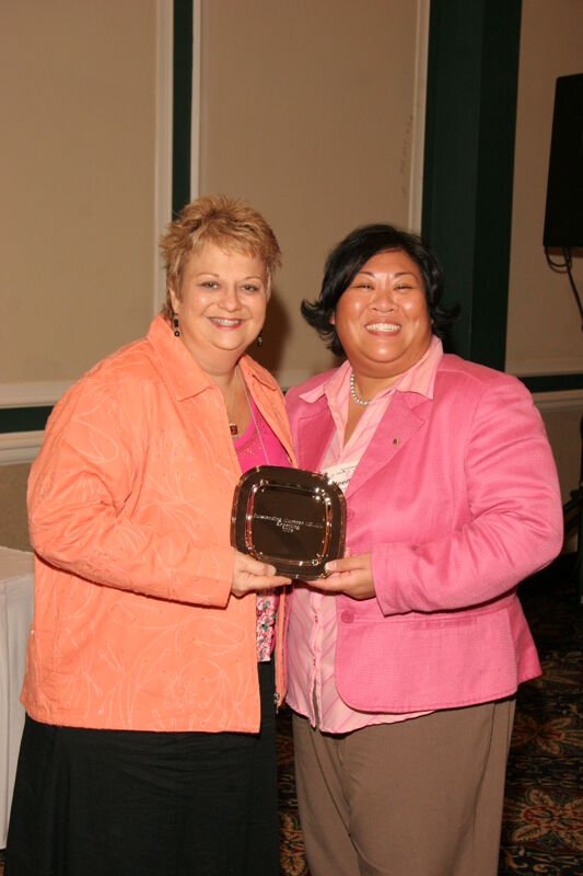 July 14 Kathy Williams and Unidentified With Award at Friday Convention Session Photograph 3 Image