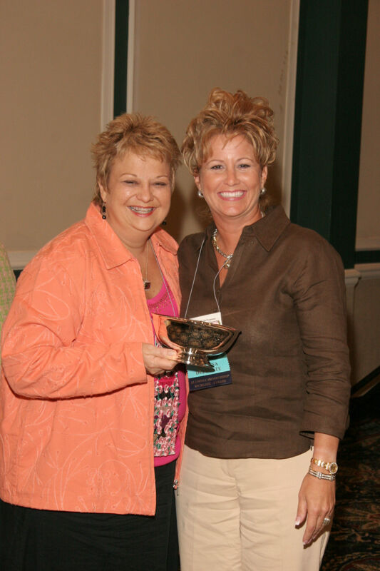 Kathy Williams and Sarah Conner With Award at Friday Convention Session Photograph, July 14, 2006 (Image)