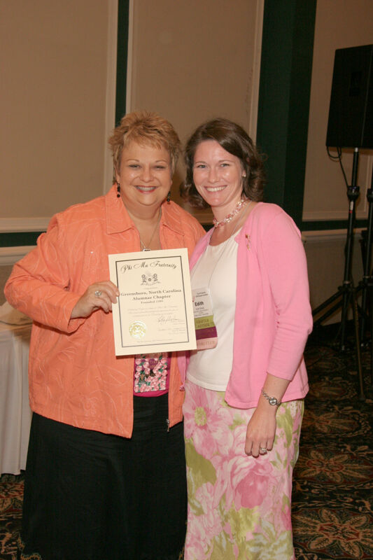 Kathy Williams and Greensboro Alumnae Chapter Member With Certificate at Friday Convention Session Photograph, July 14, 2006 (Image)