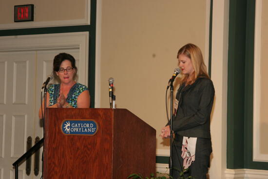 Mary Helen Griffis and Elizabeth Stevens Speaking at Friday Convention Session Photograph 1, July 14, 2006 (image)