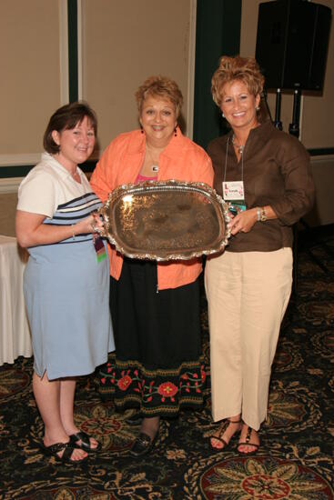 Benoit, Williams, and Conner With Award at Friday Convention Session Photograph 2, July 14, 2006 (image)