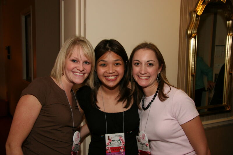 Unidentified, Huynh, and Cook at Convention Officer Reception Photograph, July 2006 (Image)