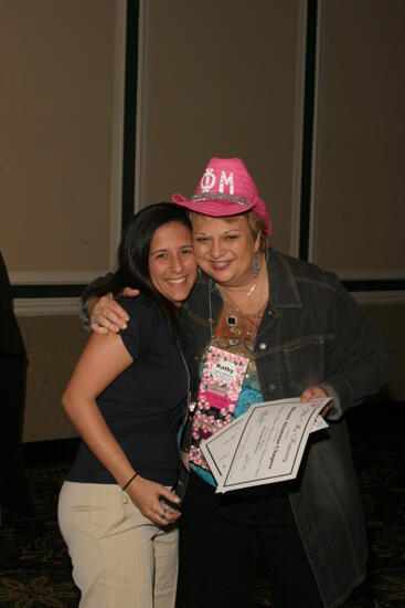 Kathy Williams and Miami Alumnae Chapter Member With Certificate at Convention Photograph, July 2006 (image)