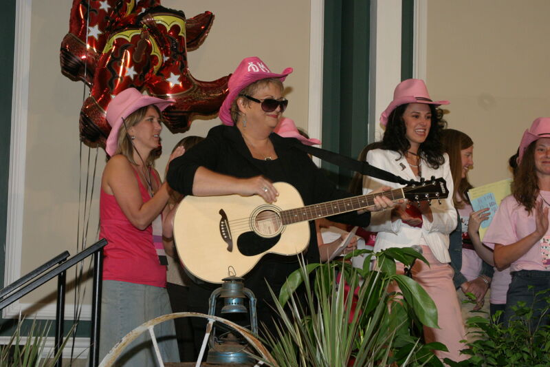 Kathy Williams Playing Guitar at Convention Photograph 2, July 2006 (Image)