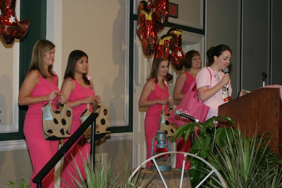 Phi Mus Modeling Clothing and Accessories at Convention Photograph, July 2006 (image)