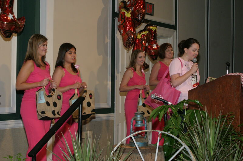 July 2006 Phi Mus Modeling Clothing and Accessories at Convention Photograph Image