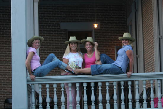 Four Phi Mus on Balcony During Convention Mansion Tour Photograph 3, July 2006 (image)