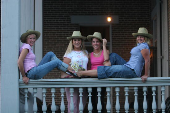 Four Phi Mus on Balcony During Convention Mansion Tour Photograph 1, July 2006 (image)