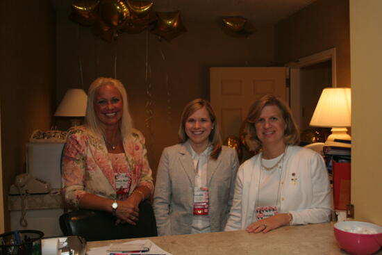 Unidentified, Jordan, and Logan at Hotel Suite at Convention Photograph 1, July 2006 (image)