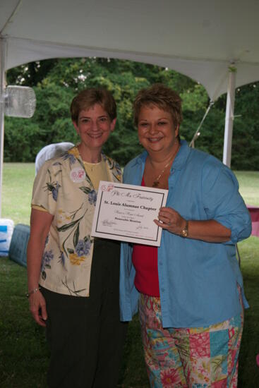 Kathy Williams and St. Louis Alumnae Chapter Member With Certificate at Convention Outdoor Luncheon Photograph, July 2006 (image)