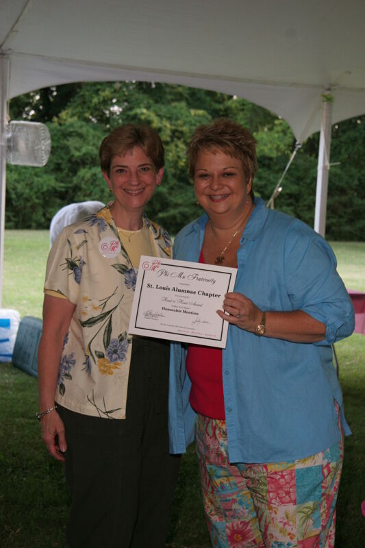 July 2006 Kathy Williams and St. Louis Alumnae Chapter Member With Certificate at Convention Outdoor Luncheon Photograph Image