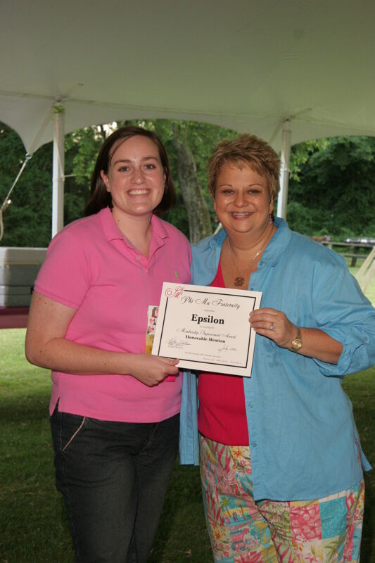 Kathy Williams and Epsilon Chapter Member With Certificate at Convention Outdoor Luncheon Photograph, July 2006 (Image)