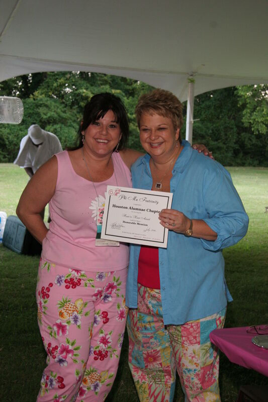 Kathy Williams and Houston Alumnae Chapter Member With Certificate at Convention Outdoor Luncheon Photograph, July 2006 (Image)