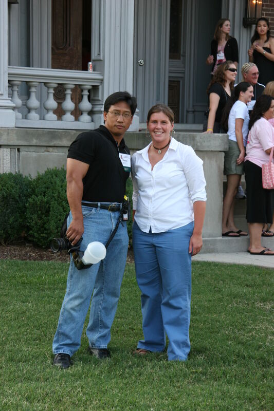 Victor and Unidentified Phi Mu During Convention Mansion Tour Photograph, July 2006 (Image)