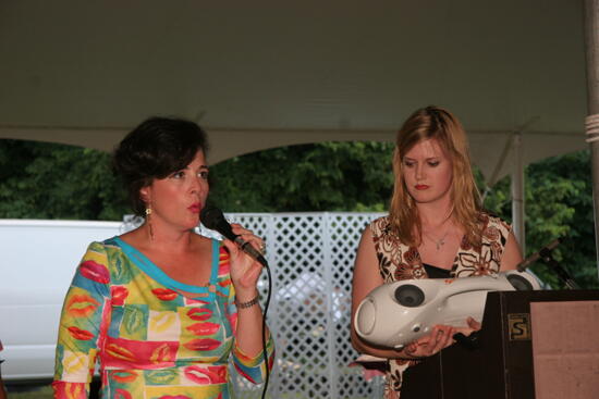 Mary Helen Griffis Singing at Convention Outdoor Luncheon Photograph 1, July 2006 (image)