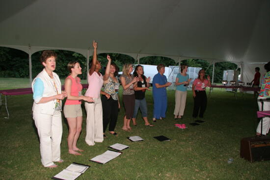 Choir Singing at Convention Outdoor Luncheon Photograph 1, July 2006 (image)