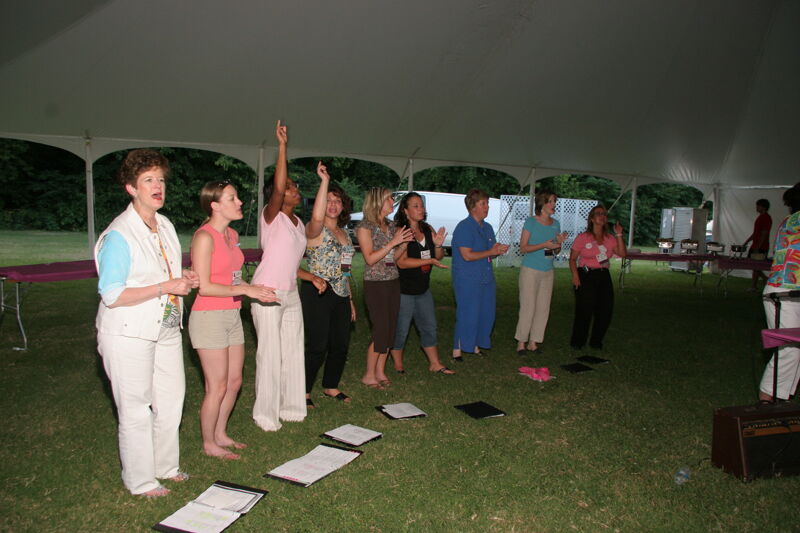 Choir Singing at Convention Outdoor Luncheon Photograph 1, July 2006 (Image)