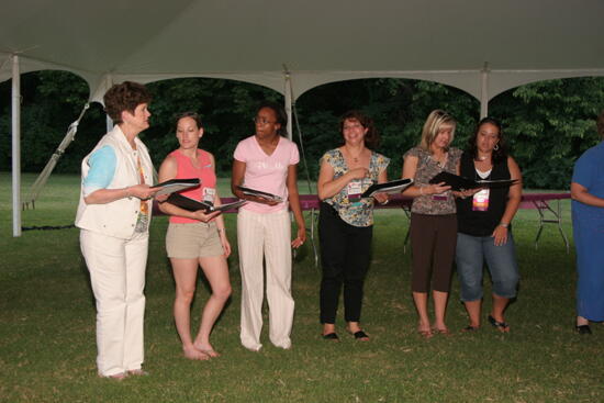 Choir Singing at Convention Outdoor Luncheon Photograph 3, July 2006 (image)