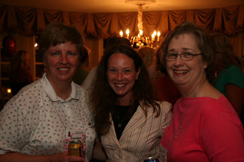 Monsanto, Williams, and Unidentified at Convention Officer Reception Photograph, July 2006 (Image)