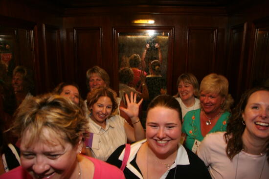 Phi Mus in Elevator During Convention Officer Reception Photograph 1, July 2006 (image)