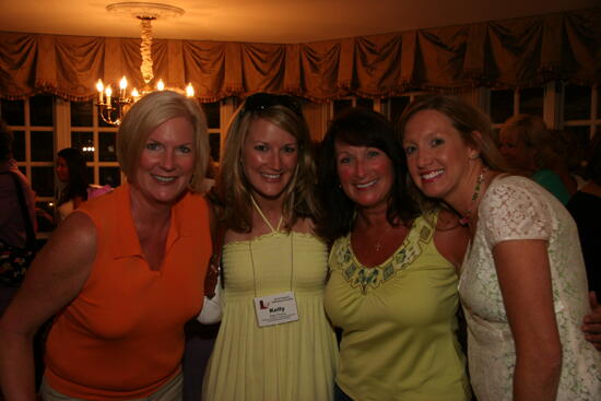 Sessums, Thorne, and Two Unidentified Phi Mus at Convention Officer Reception Photograph, July 2006 (image)