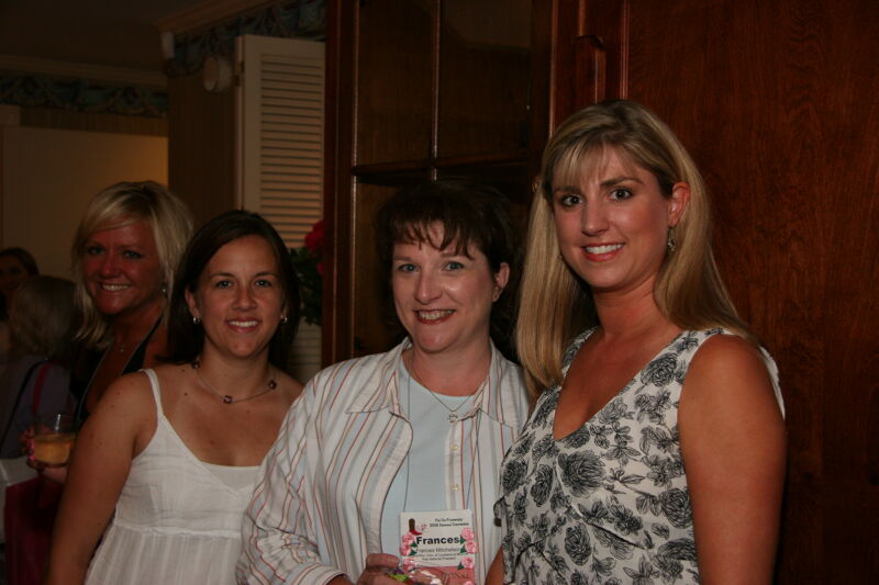Unidentified, Mitchelson, and Kash at Convention Officer Reception Photograph, July 2006 (Image)