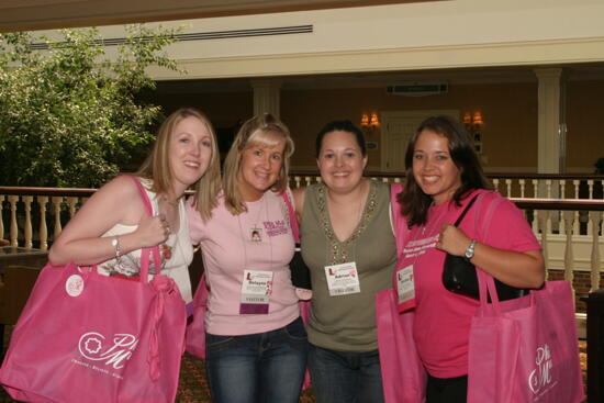 Montemayor, Cleveland, and Two Unidentified Phi Mus at Convention Registration Photograph 1, July 2006 (image)