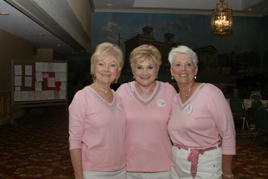 Three Unidentified Phi Mus in Pink at Convention Registration Photograph 1, July 2006 (image)