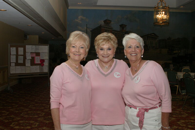 Three Unidentified Phi Mus in Pink at Convention Registration Photograph 1, July 2006 (Image)