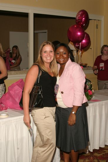 Unidentified and Kendra Edwards at Convention Registration Photograph, July 2006 (image)