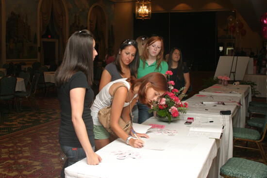 Five Phi Mus at Convention Registration Table Photograph, July 2006 (image)