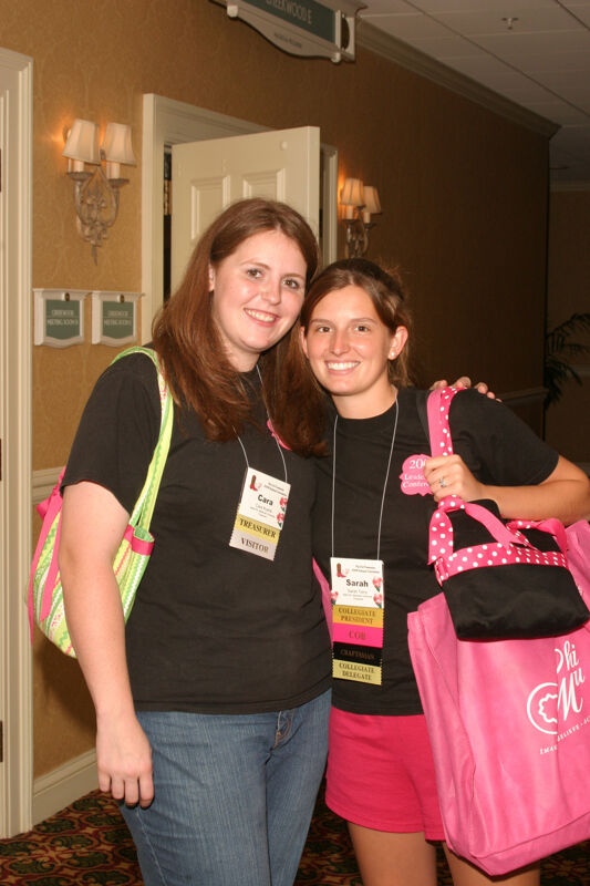 July 2006 Cara Kueck and Sarah Terry at Convention Registration Photograph Image