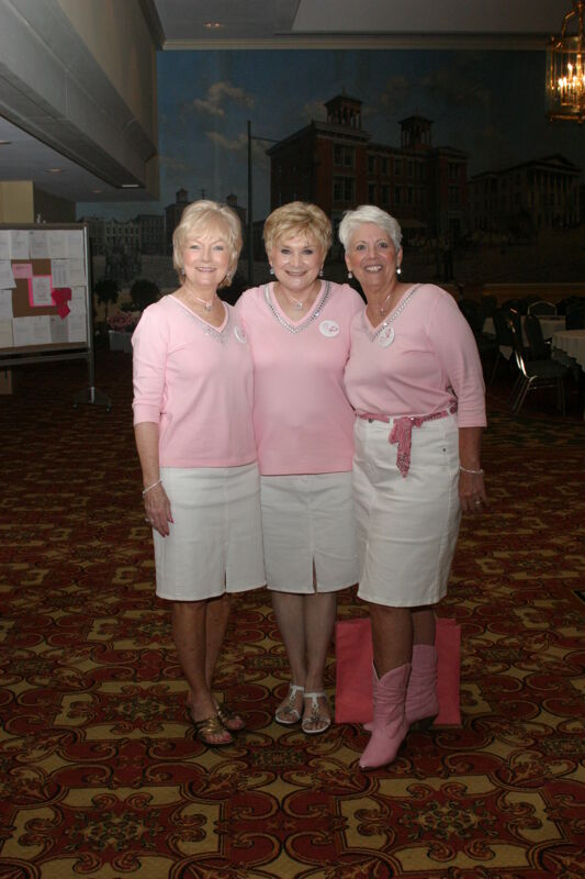 Three Unidentified Phi Mus in Pink at Convention Registration Photograph 2, July 2006 (Image)