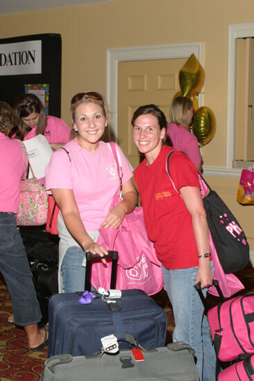 Two Phi Mus With Luggage at Convention Registration Photograph, July 2006 (image)