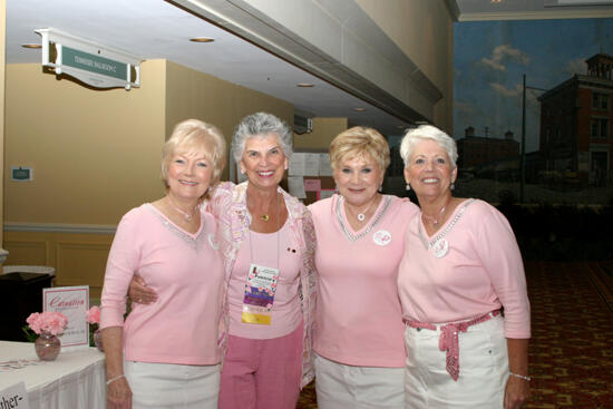 Patricia Sackinger and Three Unidentified Phi Mus at Convention Registration Photograph 1, July 2006 (image)