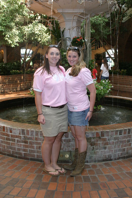 Two Unidentified Phi Mus by Convention Hotel Fountain Photograph, July 2006 (Image)