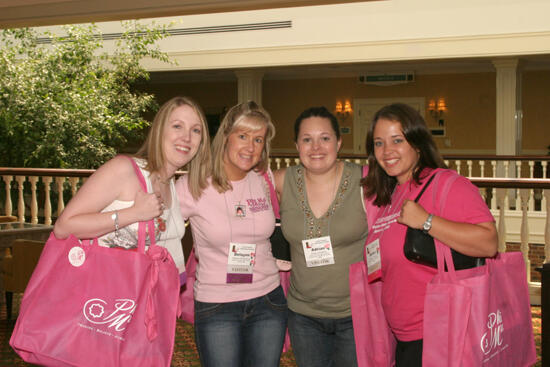 Montemayor, Cleveland, and Two Unidentified Phi Mus at Convention Registration Photograph 2, July 2006 (image)