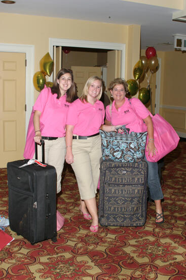 Three Phi Mus With Luggage at Convention Registration Photograph, July 2006 (image)