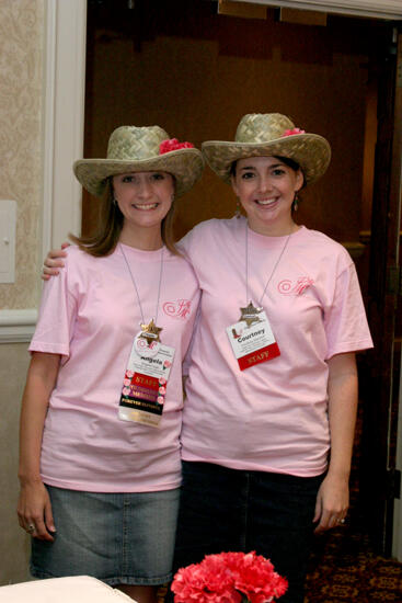 Angela Cook and Courtney Stanford in Hats at Convention Registration Photograph 2, July 2006 (image)