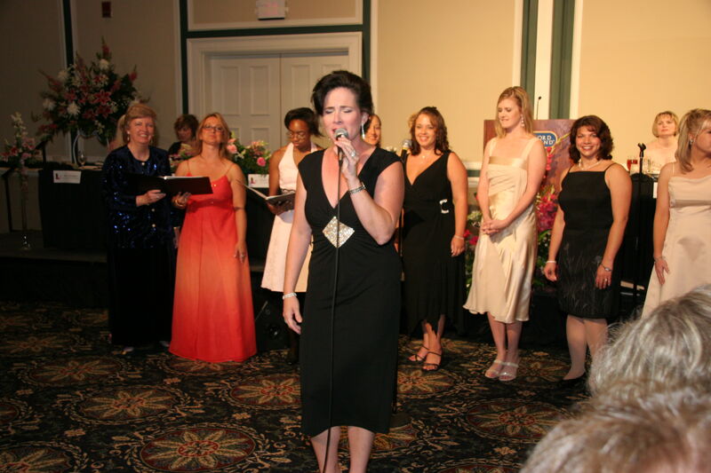 Mary Helen Griffis Singing at Convention Carnation Banquet Photograph 2, July 15, 2006 (Image)