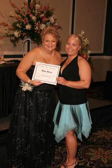 Kathy Williams and Rho Beta Chapter Member With Certificate at Convention Carnation Banquet Photograph, July 15, 2006 (image)