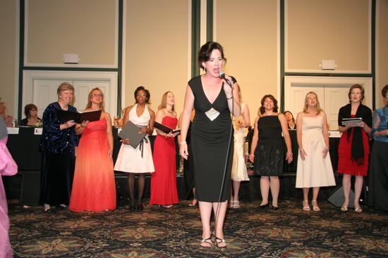 Mary Helen Griffis Singing at Convention Carnation Banquet Photograph 5, July 15, 2006 (image)